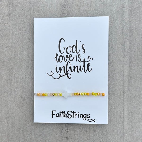 Stretch small bead bracelet Faithstrings Christian cross